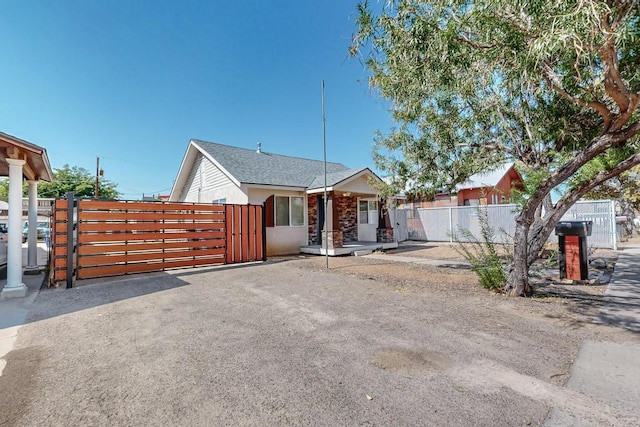 1139 Forrester Ave NW, Albuquerque, NM 87104 - ranch-style home with a gate and fence
