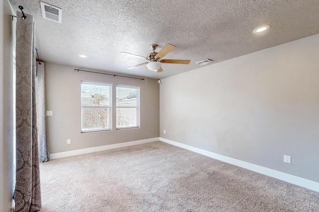1139 Forrester Ave NW, Albuquerque, NM 87104 - empty room with ceiling fan, carpet flooring, and visible vents
