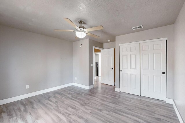 1139 Forrester Ave NW, Albuquerque, NM 87104 - unfurnished bedroom with baseboards, light wood-type flooring, and visible vents