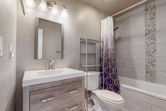 1139 Forrester Ave NW, Albuquerque, NM 87104 - bathroom with toilet, tiled shower / bath combo, vanity, and a textured wall