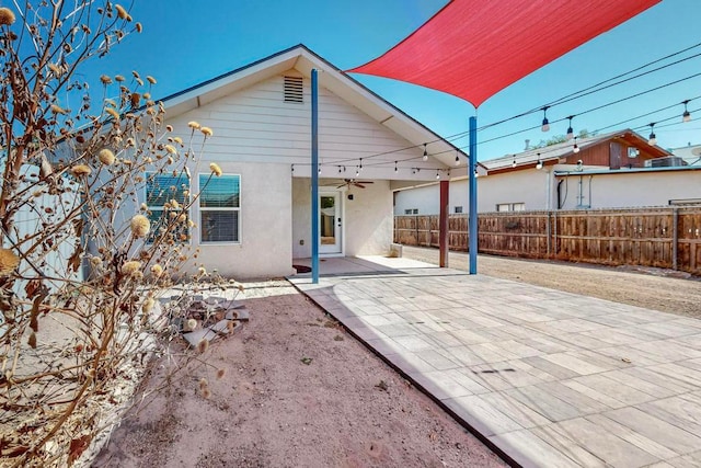 rear view of property with a patio area