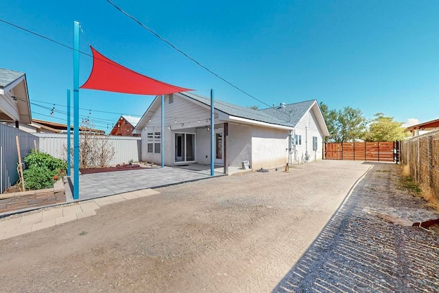 rear view of house featuring a patio area