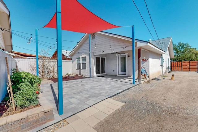 back of house with a patio area