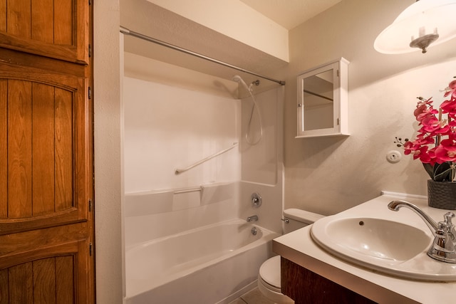 full bathroom featuring bathtub / shower combination, vanity, and toilet