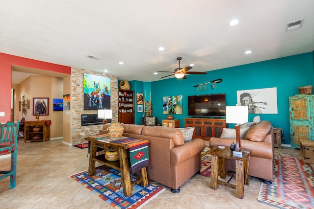 tiled living room featuring ceiling fan