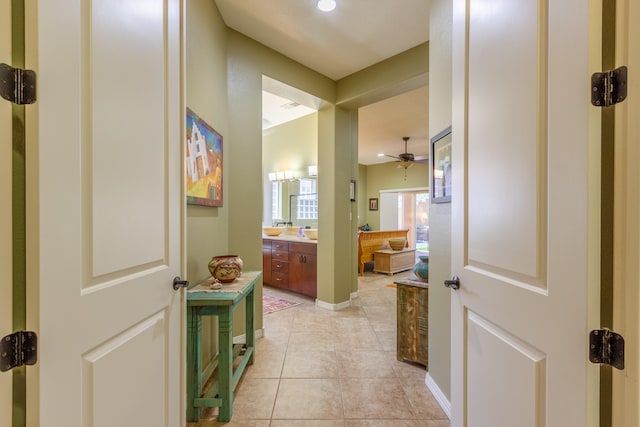 bathroom featuring vanity, ceiling fan, and tile patterned floors