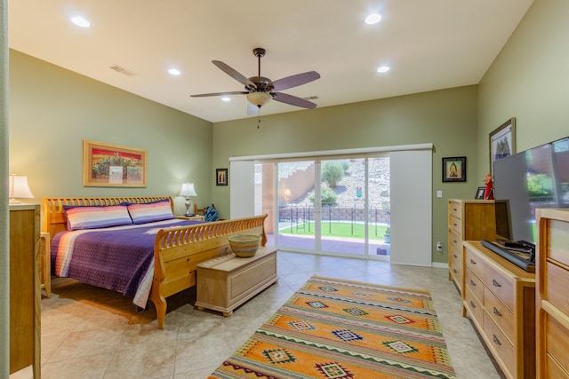 bedroom featuring access to outside, light tile patterned floors, and ceiling fan