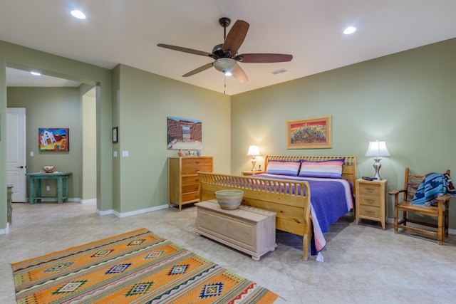 bedroom with light tile patterned floors and ceiling fan