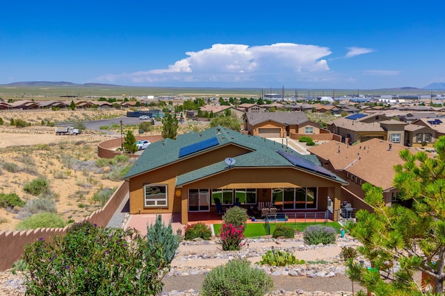 exterior space featuring a residential view and a mountain view