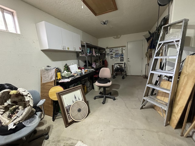 interior space featuring a textured ceiling