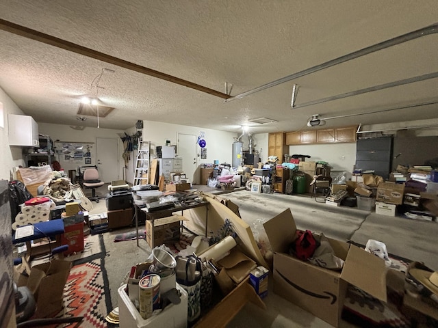 garage featuring gas water heater