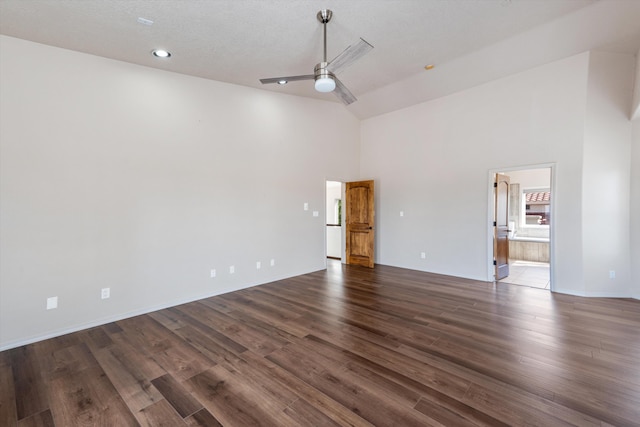 unfurnished room with ceiling fan, dark hardwood / wood-style flooring, a textured ceiling, and high vaulted ceiling