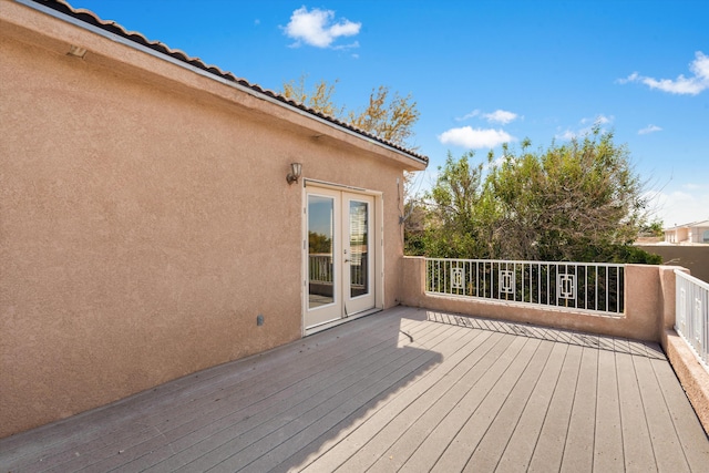 wooden deck with french doors