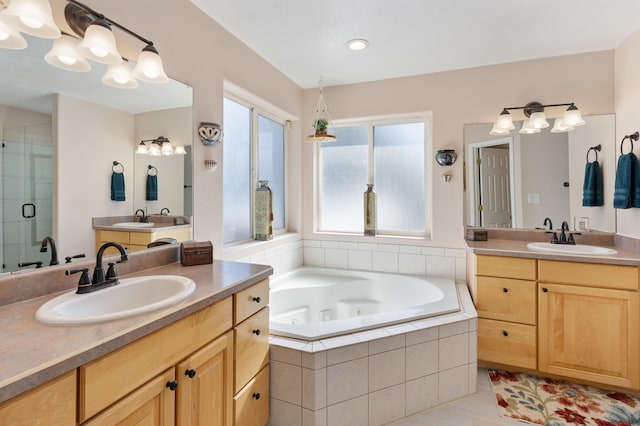 bathroom with vanity, separate shower and tub, and tile patterned flooring