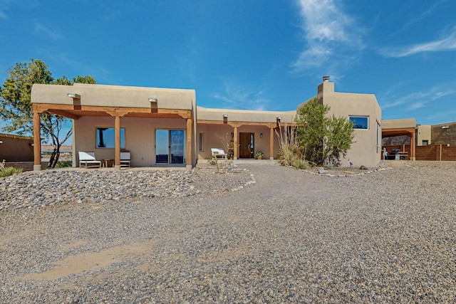 view of front facade featuring a patio area