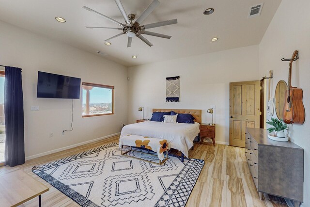 bedroom featuring light wood-type flooring and ceiling fan