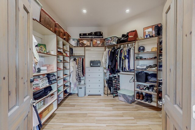 spacious closet with light wood-type flooring