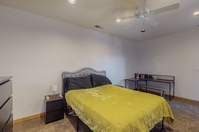 bedroom featuring ceiling fan and light colored carpet