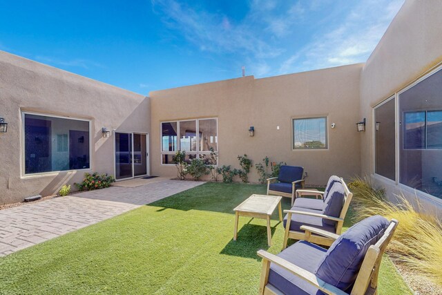 view of yard with a patio area and an outdoor hangout area