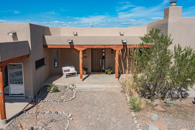 southwest-style home with a patio area