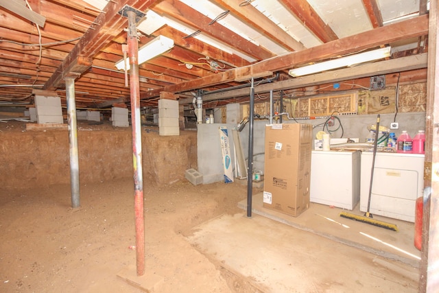 basement featuring washing machine and dryer