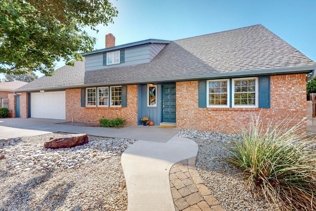 view of front of property featuring a garage