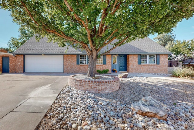 ranch-style home featuring a garage