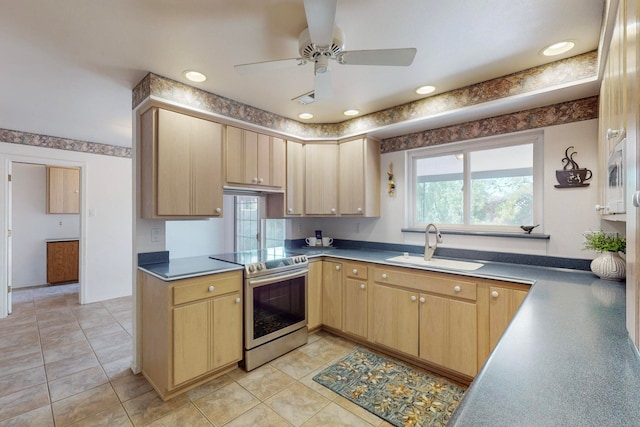 kitchen with sink, light brown cabinets, ceiling fan, light tile patterned floors, and stainless steel range with electric stovetop