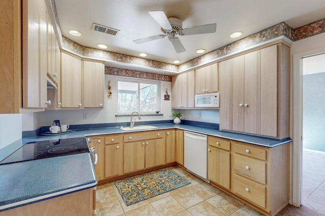 kitchen featuring light tile patterned floors, sink, ceiling fan, light brown cabinetry, and white appliances