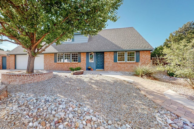 ranch-style house featuring a garage