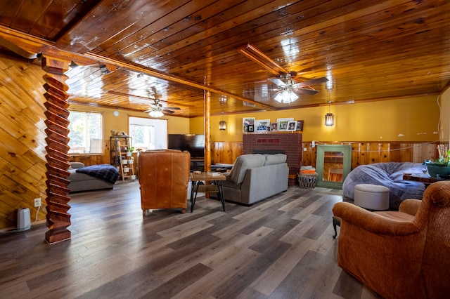 living room with dark hardwood / wood-style floors, wooden ceiling, and ceiling fan