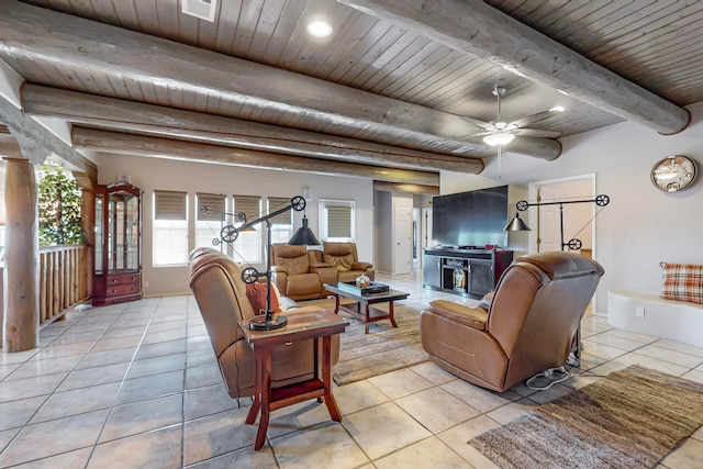 tiled living room with beamed ceiling, wooden ceiling, and ceiling fan