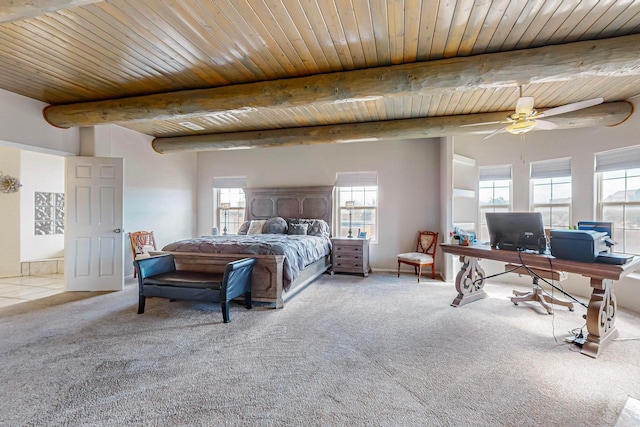 carpeted bedroom featuring beamed ceiling, multiple windows, wooden ceiling, and ceiling fan