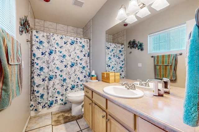 full bathroom featuring toilet, vanity, shower / bathtub combination with curtain, and tile patterned flooring