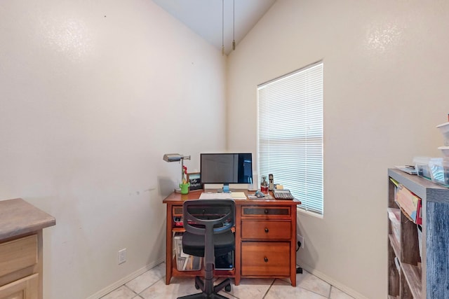 tiled office with lofted ceiling