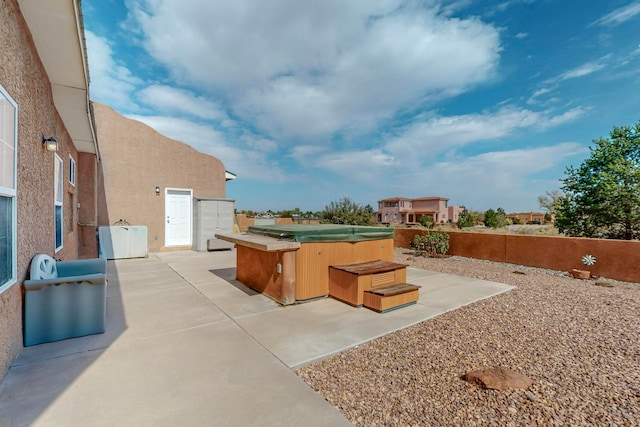 view of patio featuring a hot tub