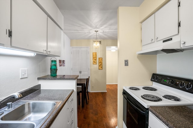 kitchen with range with electric stovetop, sink, white cabinets, dark hardwood / wood-style flooring, and hanging light fixtures