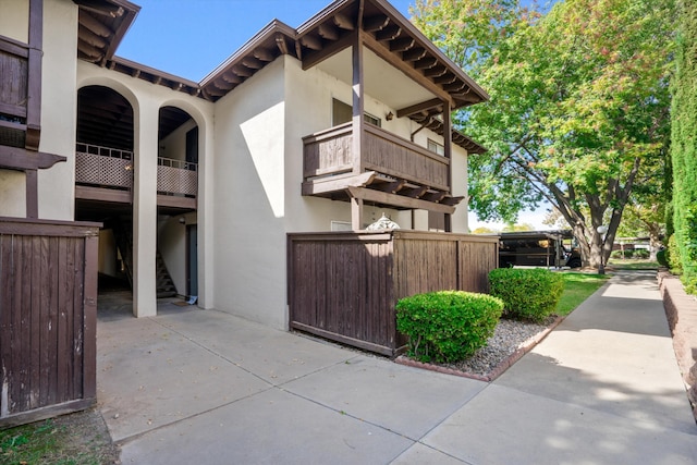 view of home's exterior featuring a balcony