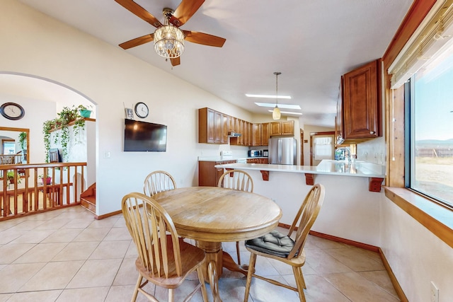401A Nm-344, Edgewood, NM 87015 - dining room with arched walkways, light tile patterned floors, baseboards, and ceiling fan