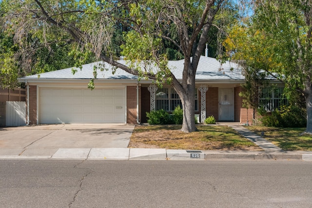 single story home with a garage