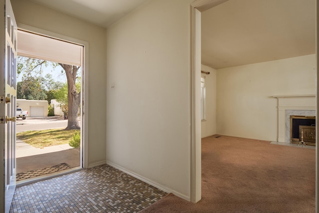 interior space featuring a high end fireplace