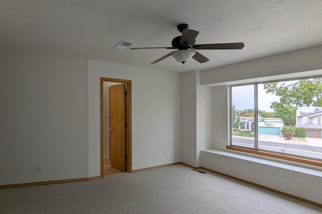 4508 Stockbridge Ave NW, Albuquerque, NM 87120 - carpeted spare room with healthy amount of natural light, a ceiling fan, and baseboards