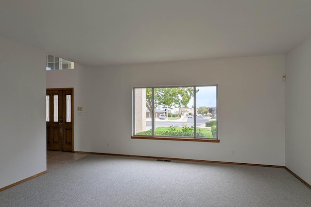 view of carpeted spare room