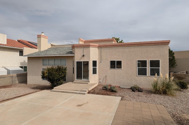 rear view of house featuring a patio area