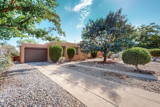 adobe home with a garage