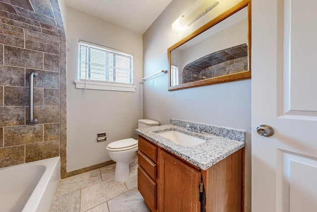 bathroom with toilet and vanity