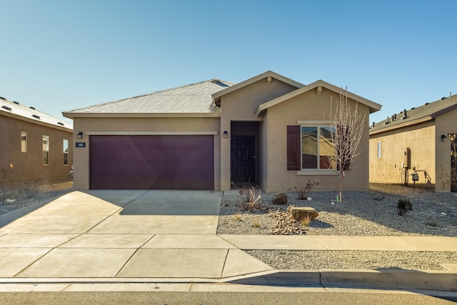 single story home with a garage