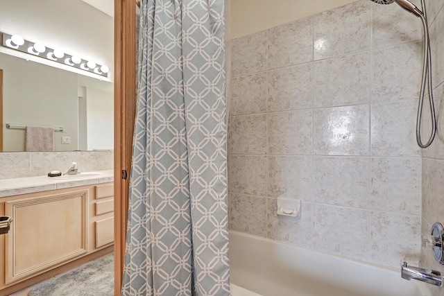 bathroom with vanity and shower / bath combo with shower curtain