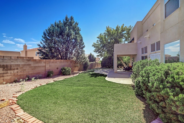 view of yard with a patio area