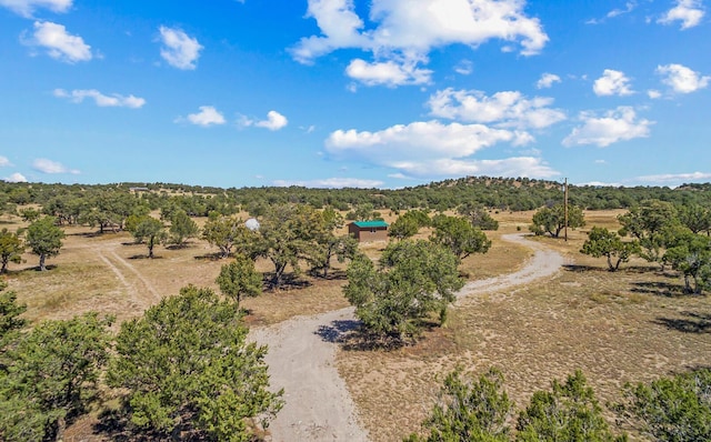 birds eye view of property featuring a rural view